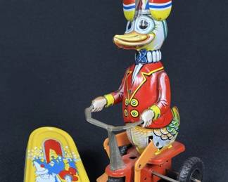 Vintage Tin Toys Noise Maker Wind up Duck Bike