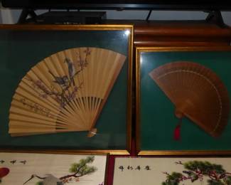 Vintage Asian/Oriental Hand Fans in Shadowbox Frames
Gold tone frames w/rich green background; fan designs:
1 – Painted birds on gold background (23” L; 30” W; 2.25” D)
2 – Wood w/eyelet design (18.5” L; 17” W; 2.25” D)
