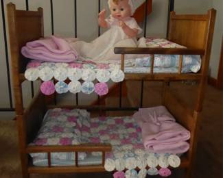 Vintage Doll Bunk Beds w/Custom Bedding 
 Beds can be separated                                                                25.5” L; 15” W; 14.25” H (single bed)/ 28.5” H (bunk beds)
