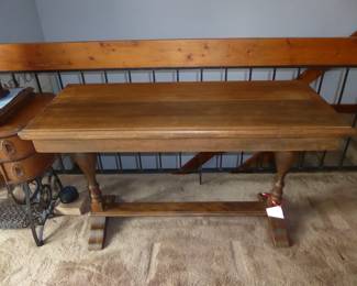 Antique Trestle/Library Table                                                                Interior drop leaf for expansion
Restored by James Curran Antiques & Restoration
48" L; 19.5" W (31" expanded); 30" H