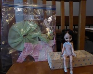 Vintage Betsy McCall Doll w/Outfits 
Jointed legs; dark brown hair (8” H); original box
Three original outfits and accessories – chemise; ballerina costume; pajama set

