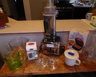 Vintage/Contemporary Kitchen Items...including... Anchor Hocking Measuring Cup Batter Bowl (2 qt.)    Vintage Hazel Atlas A&J Green Uranium Glass Measuring Cup  (1 qt.)                                                                     Pyrex Teapot/Coffeepot Lids                                                                      Vintage VitaMix Blender 3600 Plus+ Model 479043C Stainless Steel Mixer w/Recipe Book 