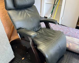Leather ‘Human Touch ‘ arm chairs , sold individually or as group