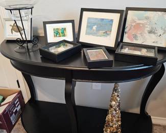 curvy console with beautiful art 