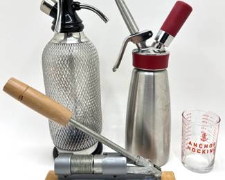 Isi Classic Sodamaker, Isi Gourmet Whip, Anchor Hocking Measuring Cup & Vintage Nutcracker
Lot #: 32