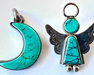 2 Sterling Pendants: Jim Behan Turquoise Angel Brooch Pin (5.0g) & Tommy Turquoise Quarter Moon Pendant (4.1g)
Lot #: 89