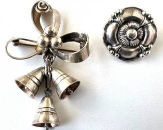 Georg Jensen Denmark 486 SterlingSilver Pin (6.7g) & Taxco Mexican Sterling Christmas Brooch (21.3g)
Lot #: 20