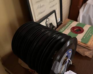 45 records in metal stand