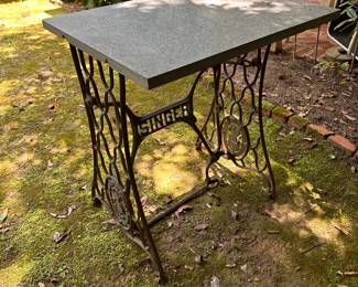Sewing machine bases