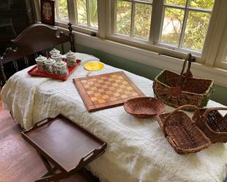 Spool youth bed with antique baskets