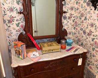 Antique marble-top dresser and mirror