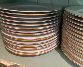 Large stacks of Pottery Barns dishes