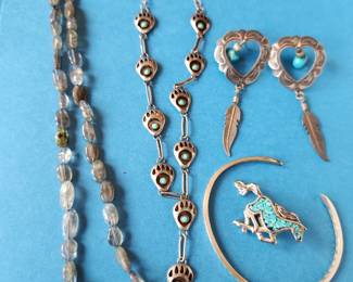 Silver, Turquoise and Precious Stones.