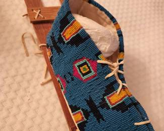 Native American Beaded Moccasin art piece.