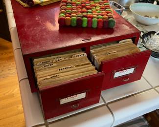 Vintage recipes in red metal file, great for a retro chef.