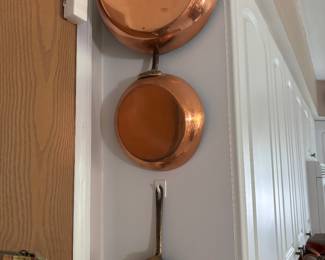 Lots of copper pots and pans
