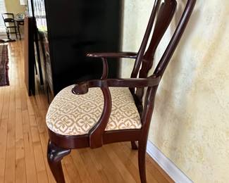 Side View of Cherry Captains Dining Chair.