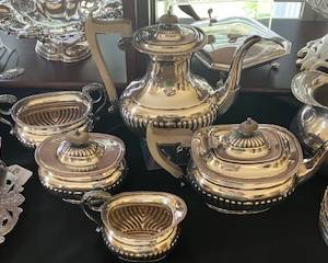 Detailed View of the Sheffield England Silver Plate Coffee and Tea Service.