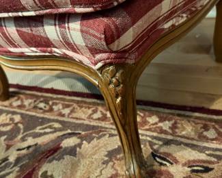 Up Close of the Upholstered French Slipper Chair Leg Details.