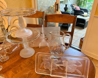 Two Beautiful Hobbs "Tree of Life" Cake Plates Available Shown with a Princess House Heritage Pitcher and Beautiful Etched Platters.