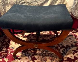 One of a Pair of Wooden Foot Stools Upholstered in Black Floral Fabric.
