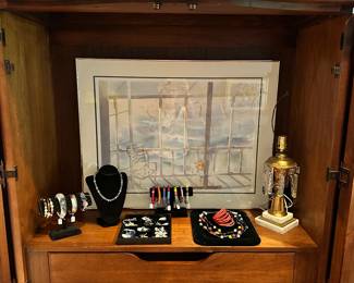 Interior View of the Thomasville Wardrobe with Wonderful Home Decor and Jewlery.