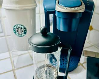 Detailed View of the Starbucks Storage Container, Keurig Coffee Maker and Bodum French Press.