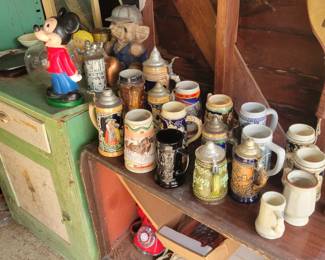 Stien mugs, phones, green table