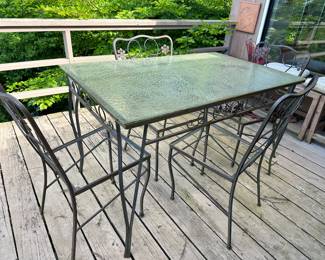 Rod Iron glass top outdoor table and chairs