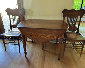 Nice antique folding drop leaf table with casters and several original leaves to expand as desired.