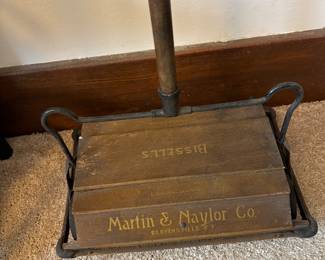 Early bissell carpet sweeper. Local store printed on it.