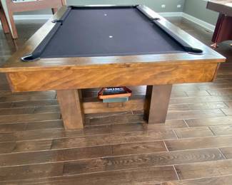 Brunswick pool table with interchangeable ping pong table top