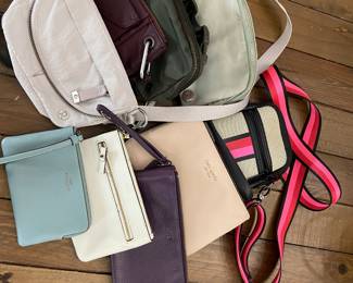 Assorted wallets and purses (lulu lemon, athleta, coach)