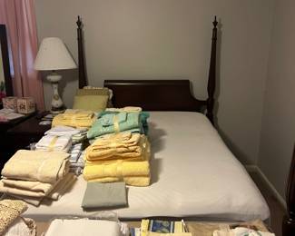 linens, poster bed with lift mattress