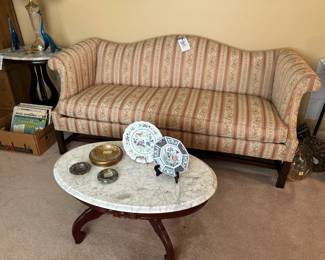 mt coffee table, beautiful camel back sofa, decor