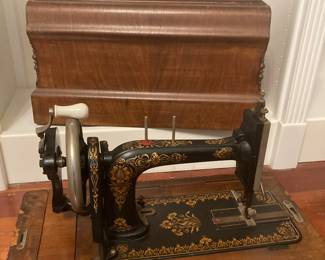 Another antique sewing machine with lovely wood case