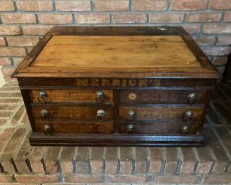 Antique oak Merrill spool cabinet