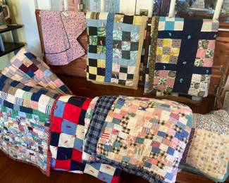 Many quilts some upstairs and downstairs