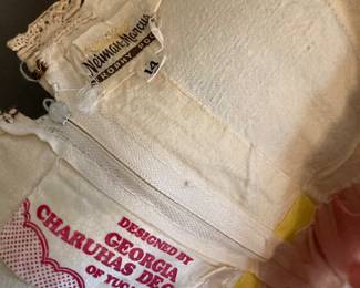 Tags in back neckline of dress. 