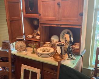 Beautiful Hoosier cabinet filled with amazing vintage kitchen dishes, mixer, scales, milk bottles, etc