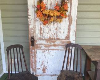 Free standing vintage door and pair of vintage chairs