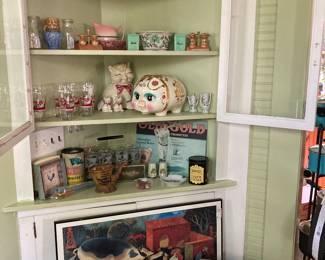 Lots of vintage vases, salt & pepper shakers, cookie jars. Very unique Chinese hand painted pot bellied pig piggy bank.  Chippy old table with perfect patina. Large framed farm print