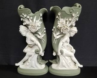 Pair of Rococo style figural vases