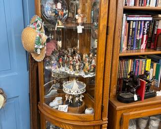 Hummel and Normal Rockwell figurines