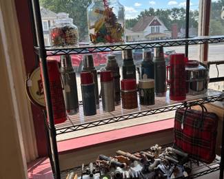 Assortment of vintage Thermoses..Aladdin, Stanley, Plaid carrier with Thermoses.