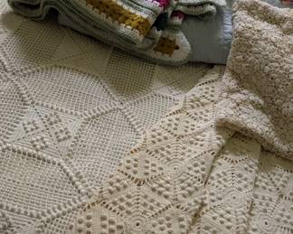 Antique crocheted bedspreads & other vintage blankets.