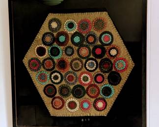 Fabulous vintage framed wool 'penny' rug.