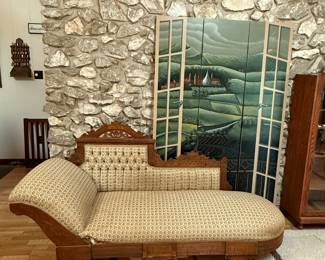 Three-panel room divider and antique settee.
