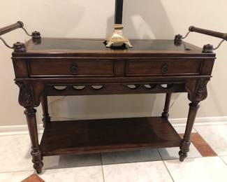 Bassett mahogany finish server with wine bottle rack and undertier
