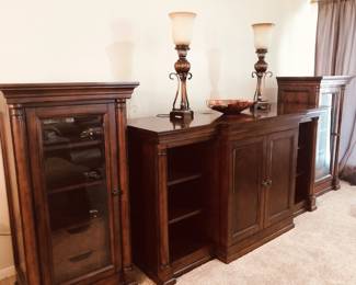 Bassett mahogany finish convertible entertainment/media stand with adjustable doors and shelves; and pair of side cabinets with glazed doors